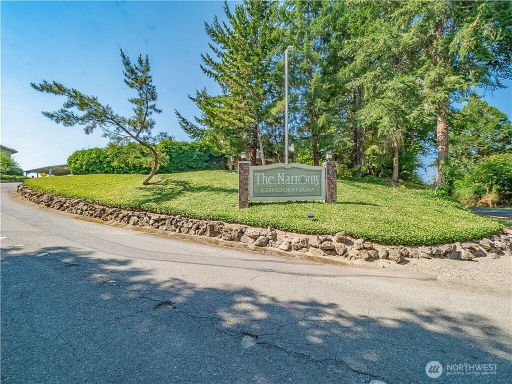 3390 Narrows Lane Northeast, Unit 101 Bremerton, WA 98310 - Photo 29 of 29 a sign board with a garden