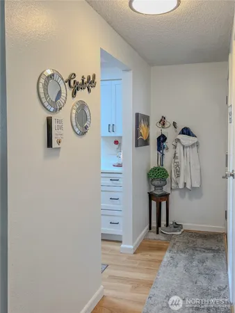 a view of small space with a wooden floor