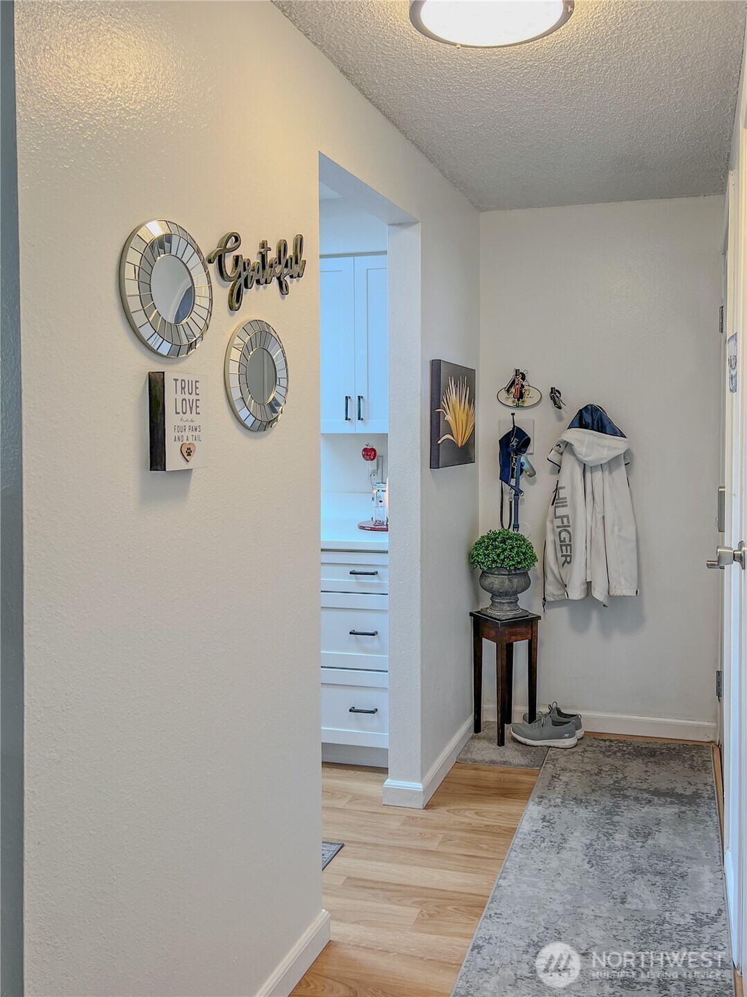 3390 Narrows Lane Northeast, Unit 101 Bremerton, WA 98310 - Photo 9 of 29 a view of small space with a wooden floor