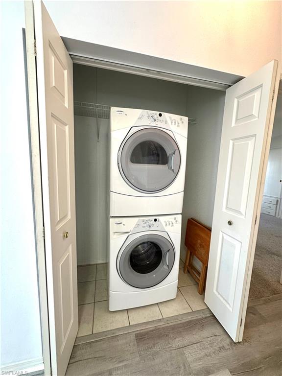 4551 Mayflower Way East Estero, FL 33928 - Photo 12 of 20 a utility room with dryer and washer