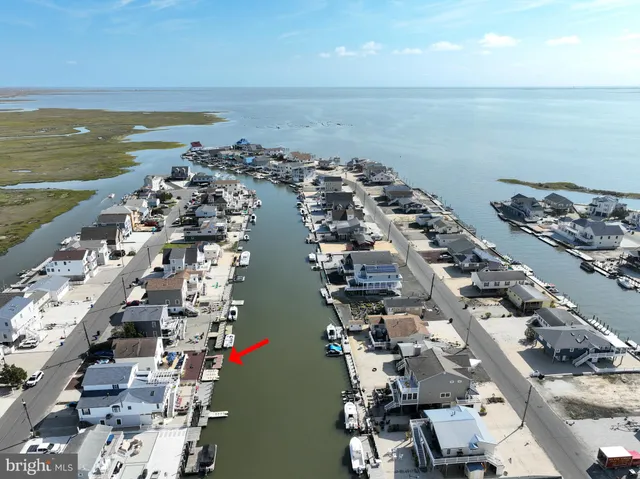 a view of ocean with lots of residential buildings and ocean view