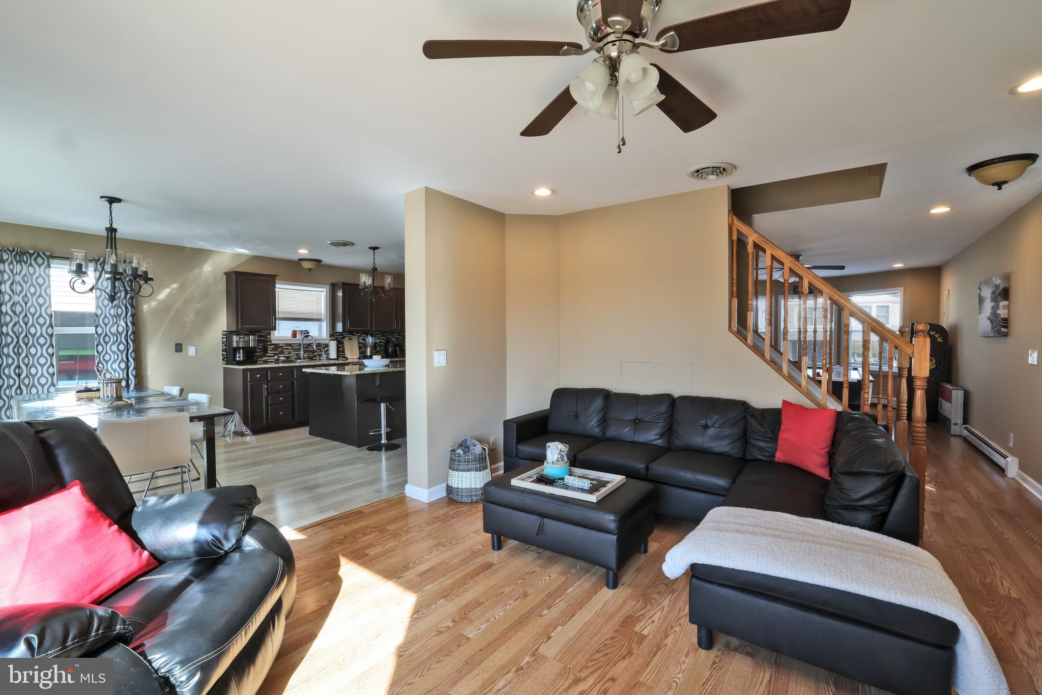 348 Kingfisher Road Tuckerton, NJ 08087 - Photo 8 of 37 a living room with furniture and a wooden floor