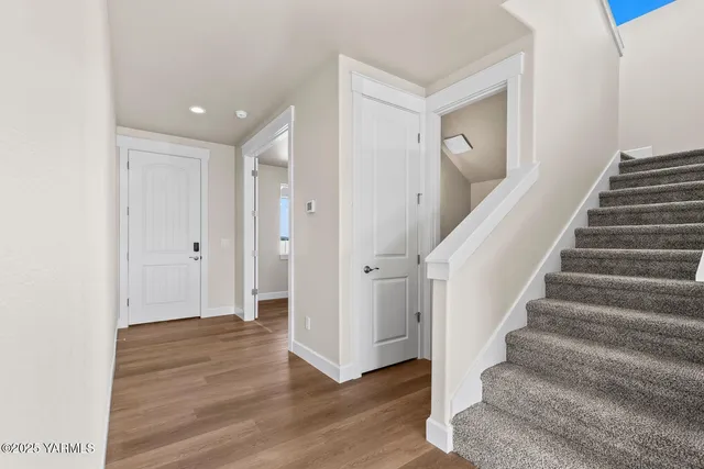 a view of entryway with wooden floor