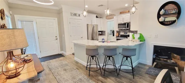 a view of kitchen with breakfast area