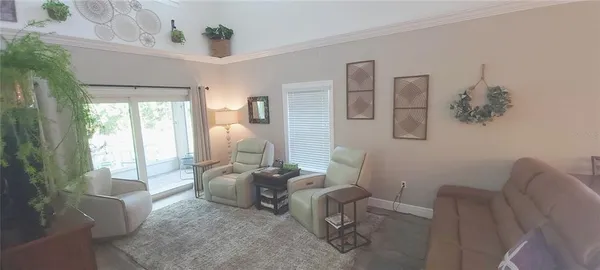 a living room with furniture and a window