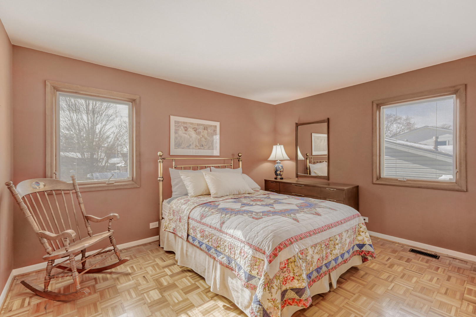 295 Brighton Road Elk Grove Village, IL 60007 - Photo 10 of 26 a bedroom with a bed chair and two windows