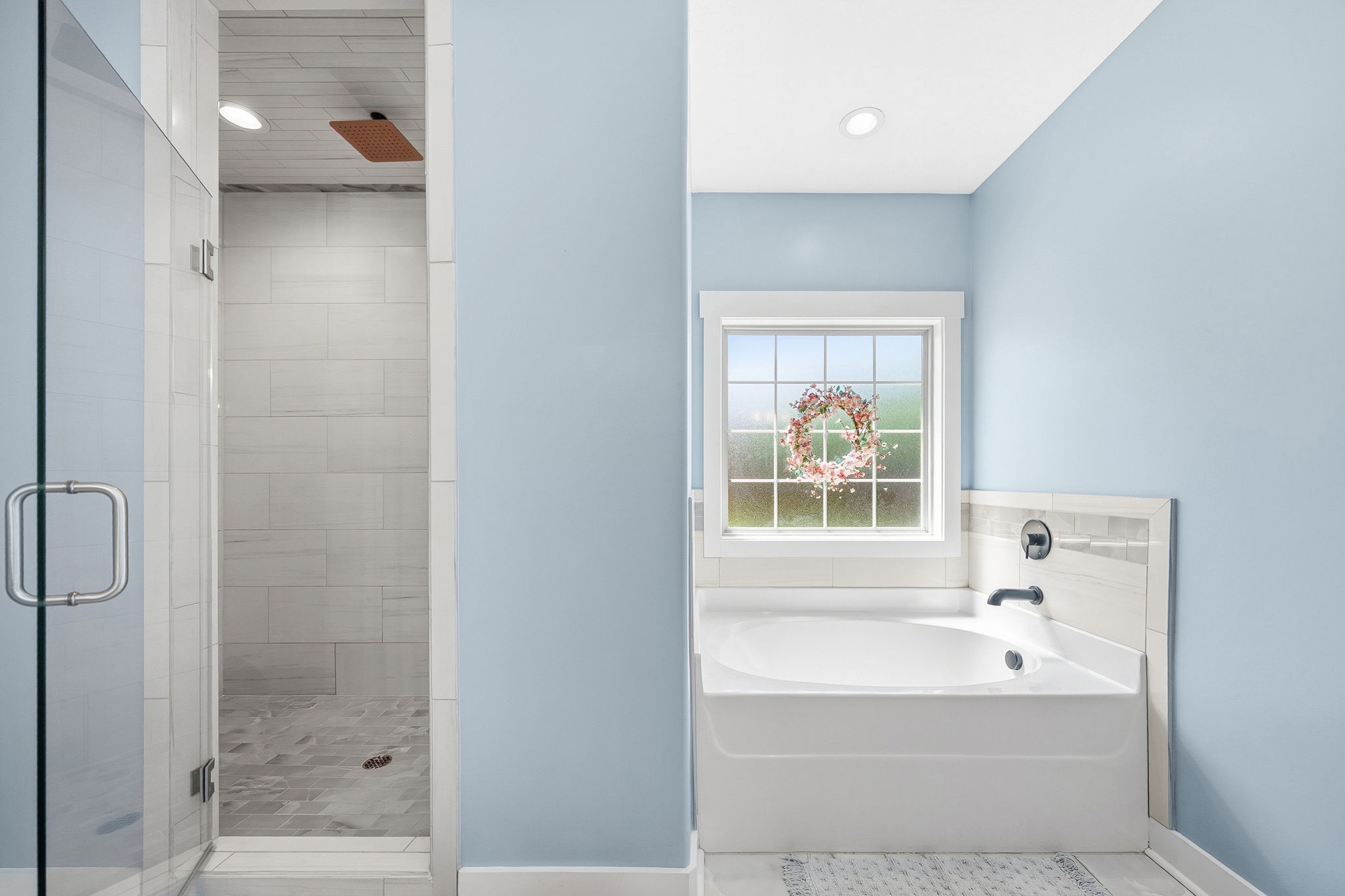 4334 Memory Lane Adams, TN 37010 - Photo 26 of 63 a bathroom with a bathtub and a shower
