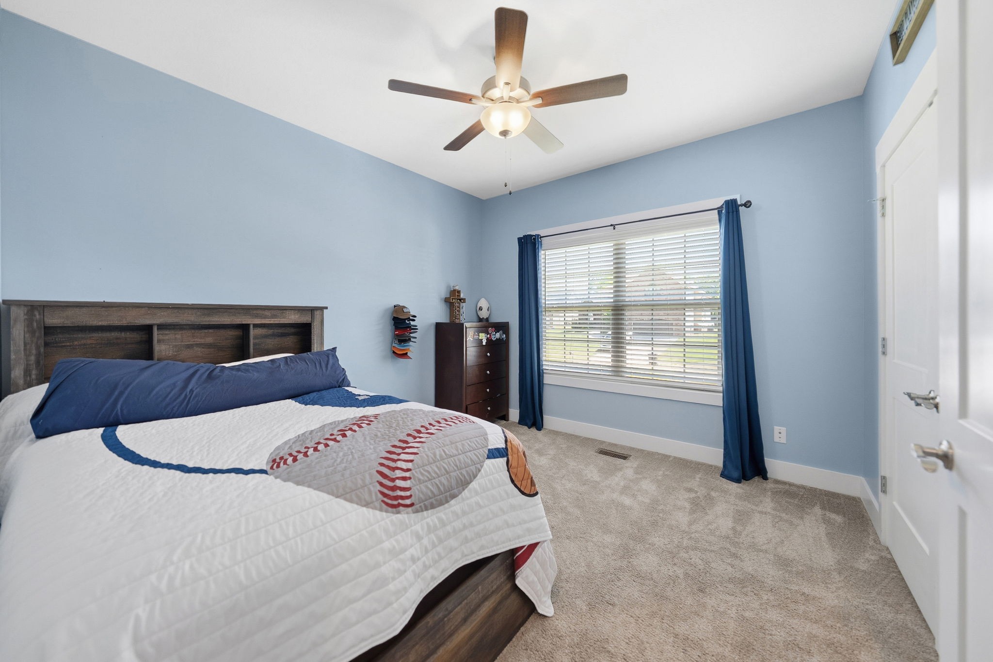 4334 Memory Lane Adams, TN 37010 - Photo 38 of 63 a bedroom with a large bed and a window
