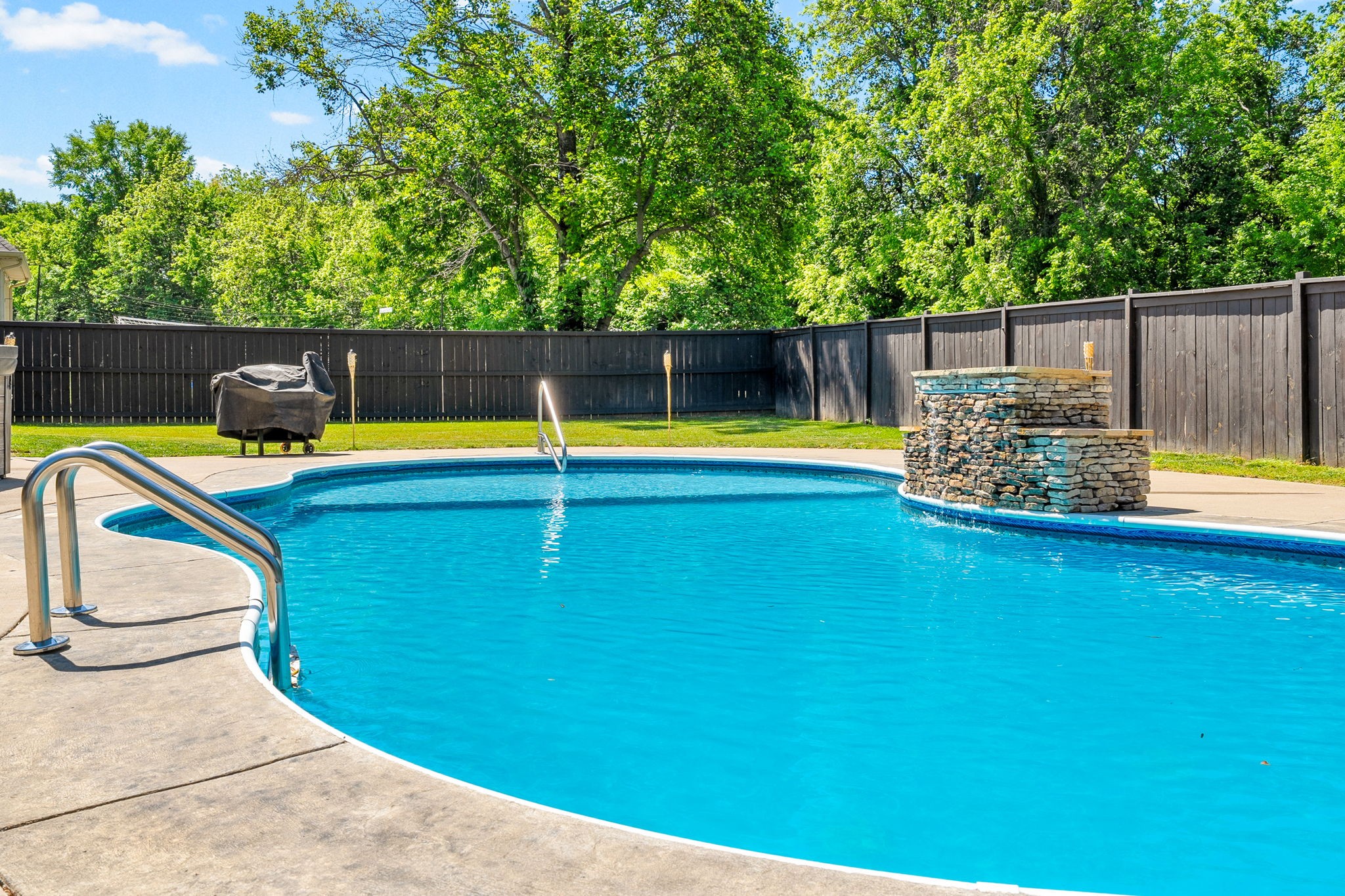 4334 Memory Lane Adams, TN 37010 - Photo 54 of 63 a view of a swimming pool with a lounge chair