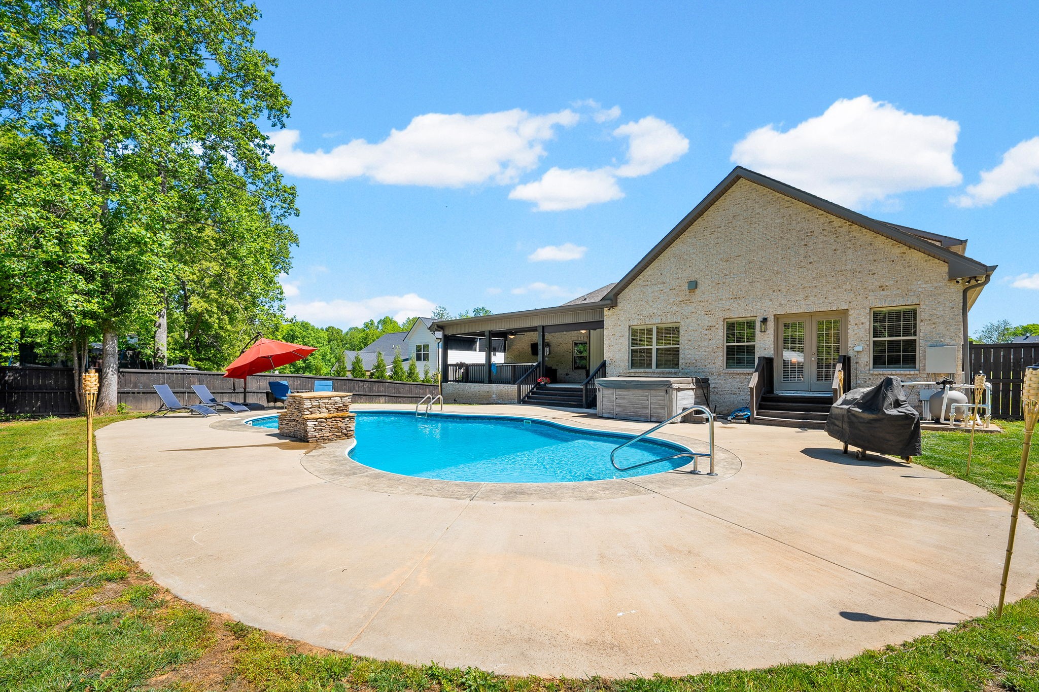 4334 Memory Lane Adams, TN 37010 - Photo 55 of 63 a view of a house with swimming pool and sitting area