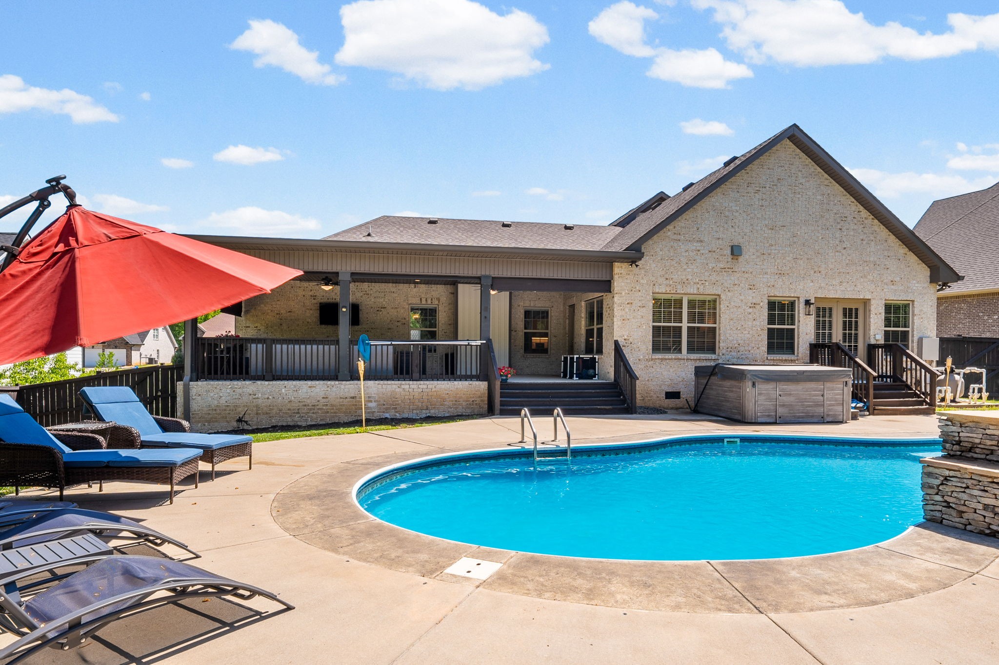 4334 Memory Lane Adams, TN 37010 - Photo 58 of 63 a view of a house with swimming pool and sitting area