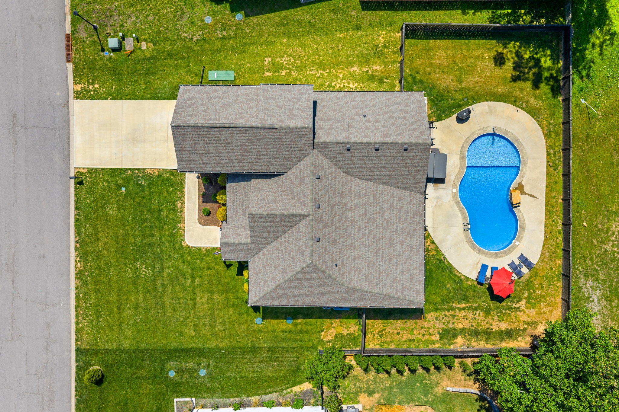 4334 Memory Lane Adams, TN 37010 - Photo 59 of 63 a view of swimming pool outdoor seating area and covered with green space
