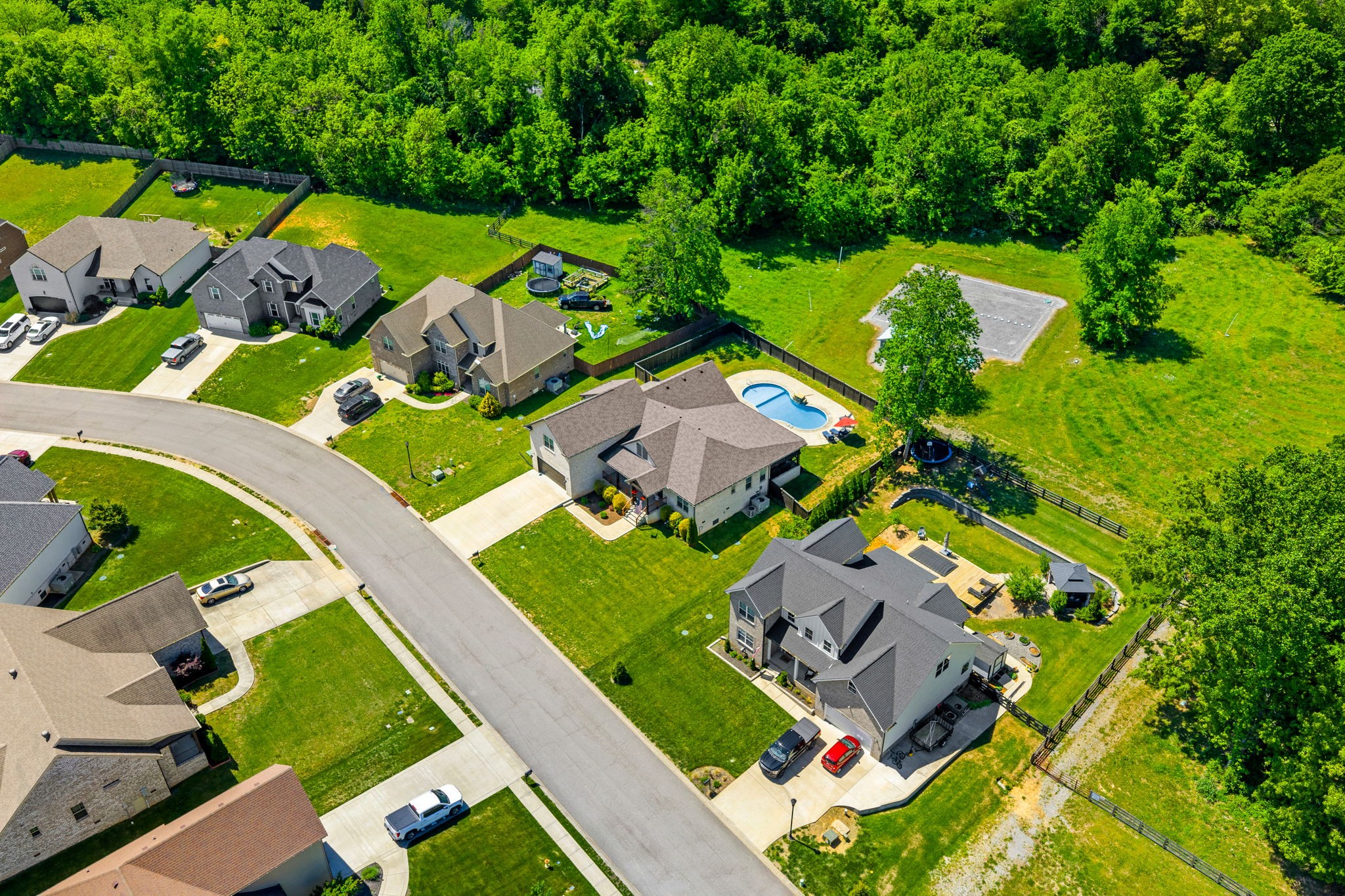4334 Memory Lane Adams, TN 37010 - Photo 61 of 63 an aerial view of a house with a garden