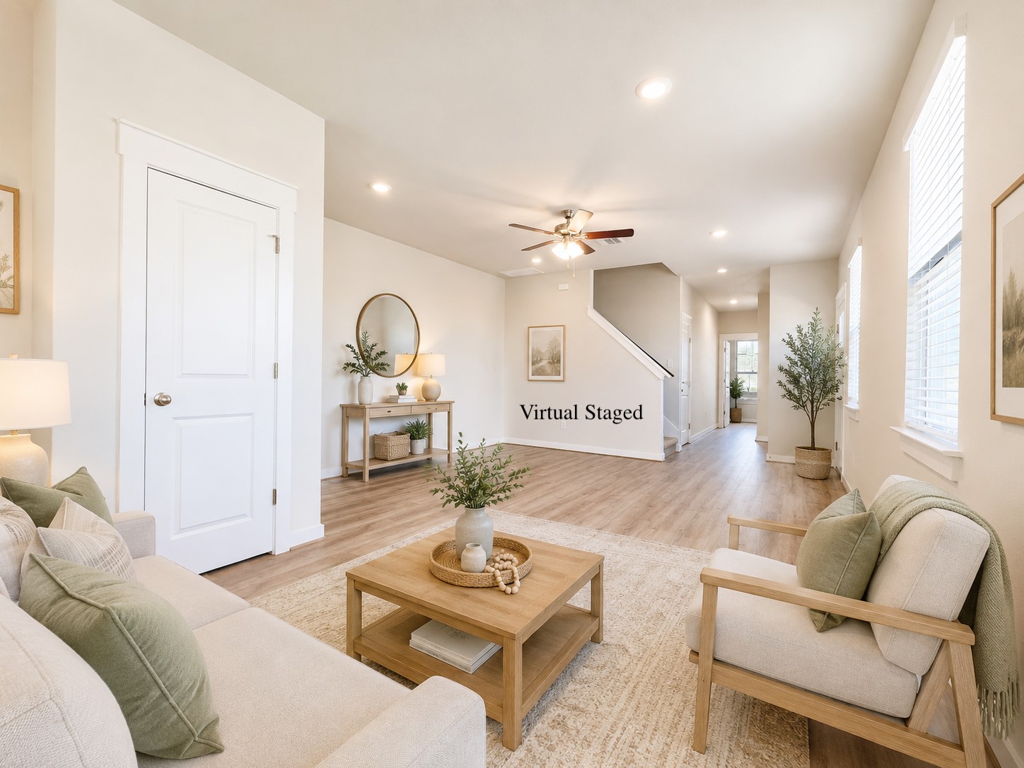 147 Waterside Road, Unit A Buda, TX 78610 - Photo 4 of 27 Natural light fills this open-concept living space with warm, inviting tones.