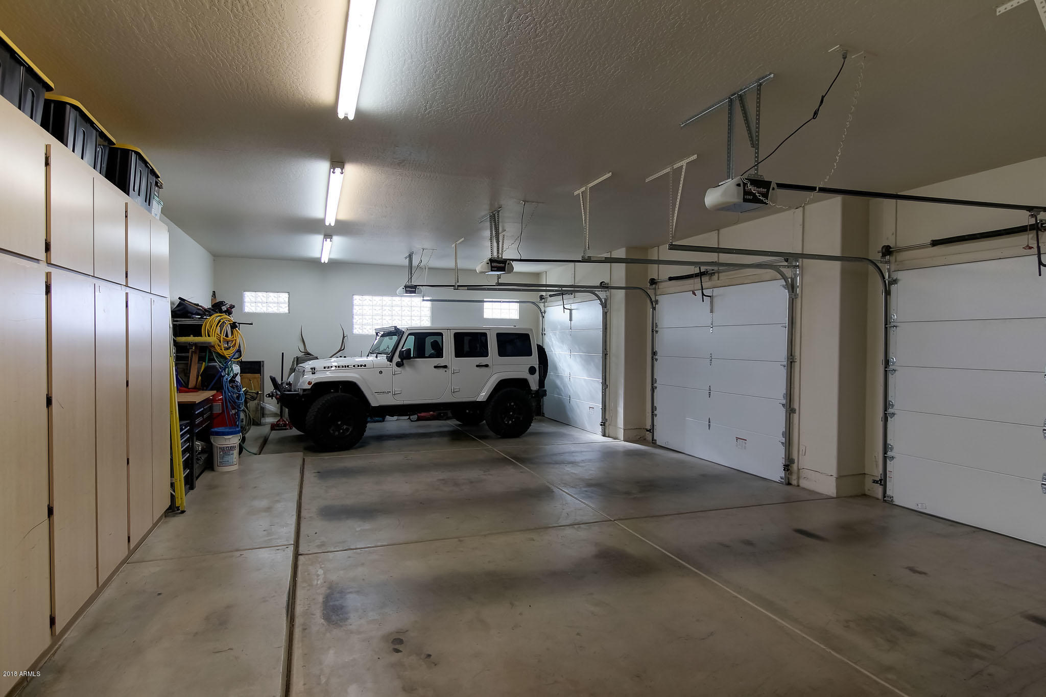 726 West Briles Road Phoenix, AZ 85085 - Photo 6 of 63 Garage with 8' tall doors