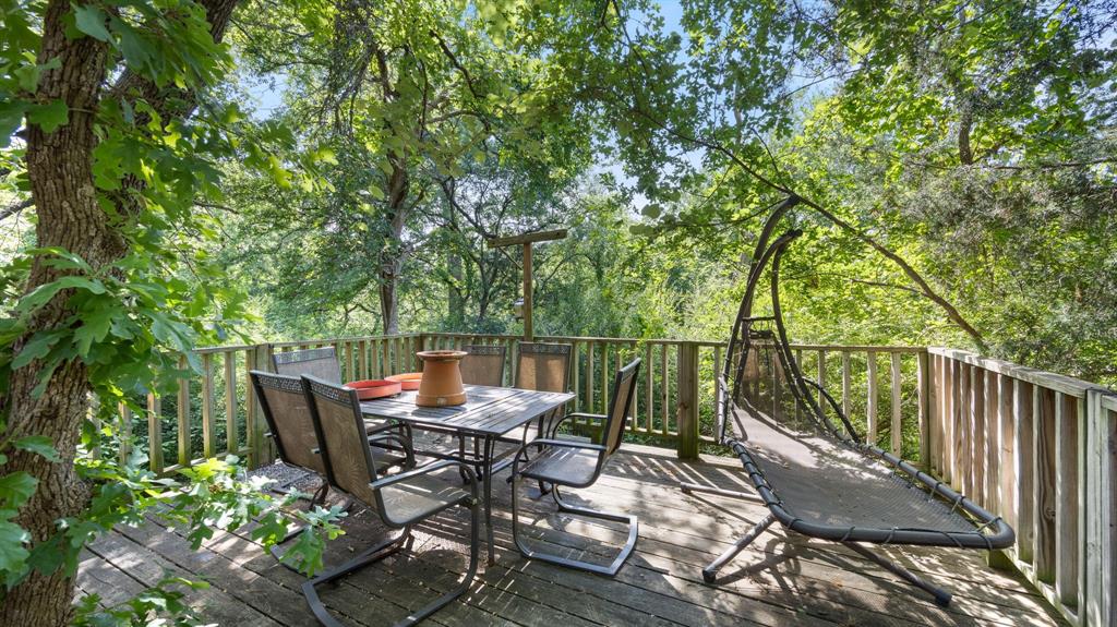 1508 Valley Creek Road Denton, TX 76205 - Photo 23 of 33 a view of a chairs and table in the patio