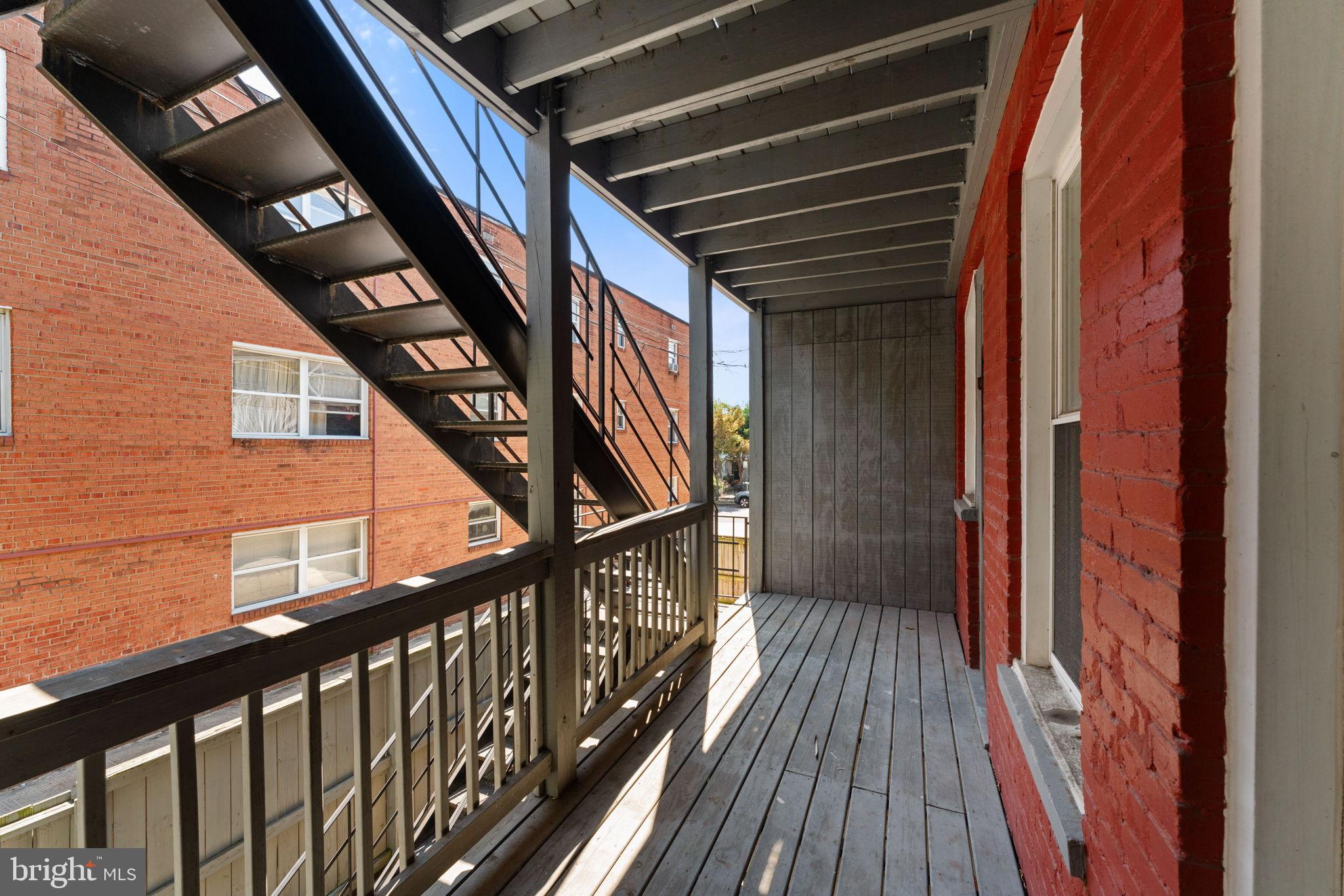 2707 11th Street Northwest Washington, DC 20001 - Photo 24 of 49 a view of balcony with wooden floor
