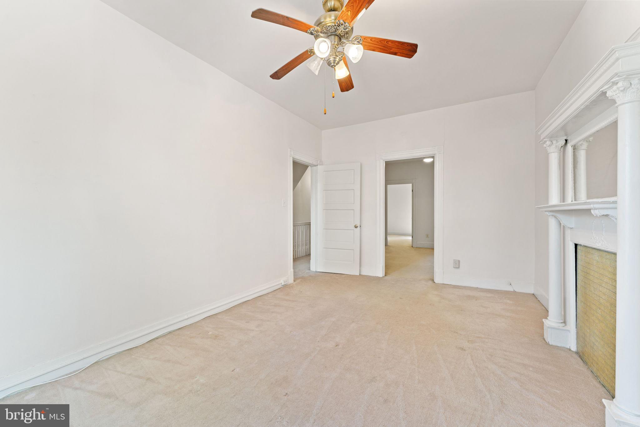 2707 11th Street Northwest Washington, DC 20001 - Photo 29 of 49 a view of an empty room with chandelier fan