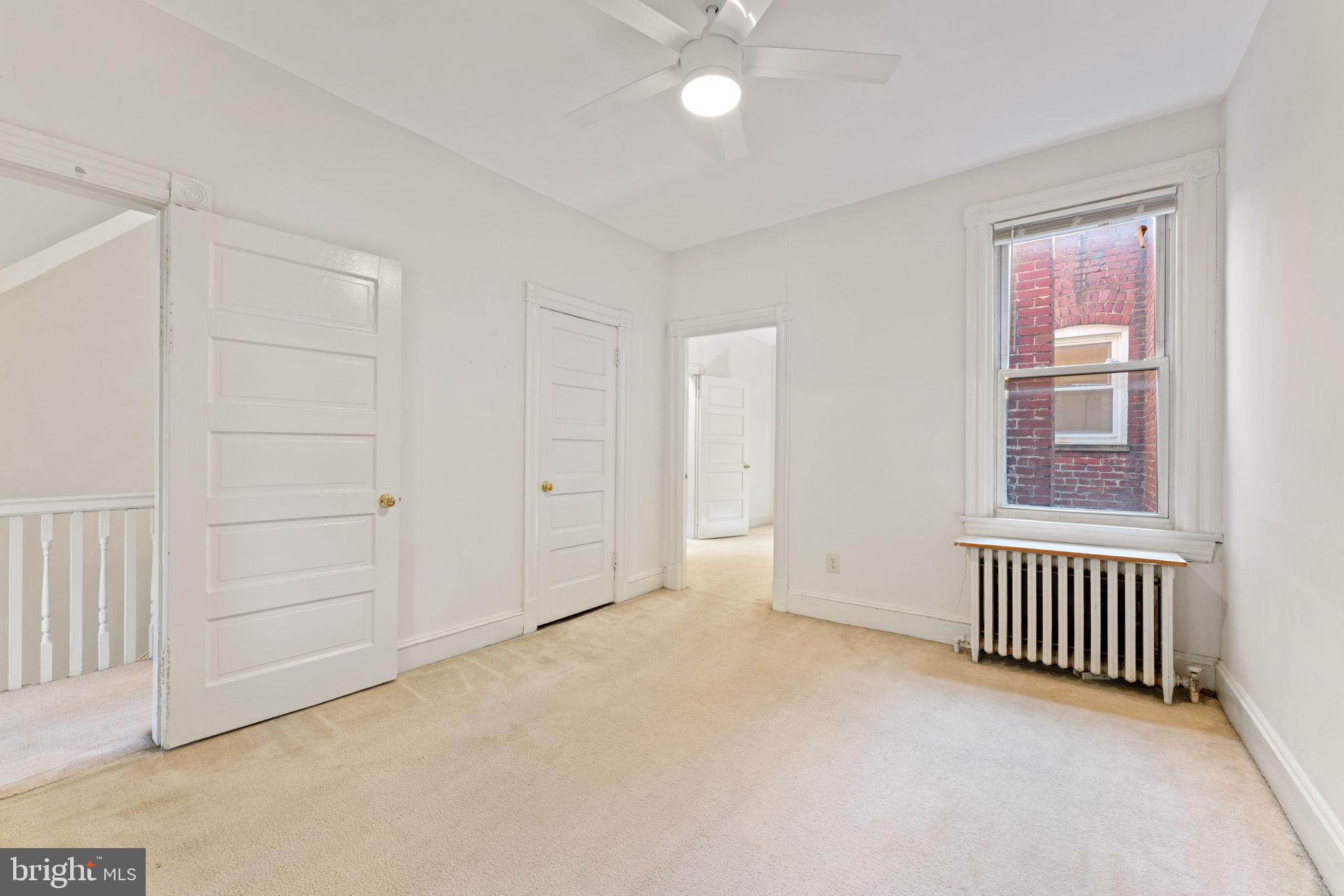2707 11th Street Northwest Washington, DC 20001 - Photo 31 of 49 an empty room with windows