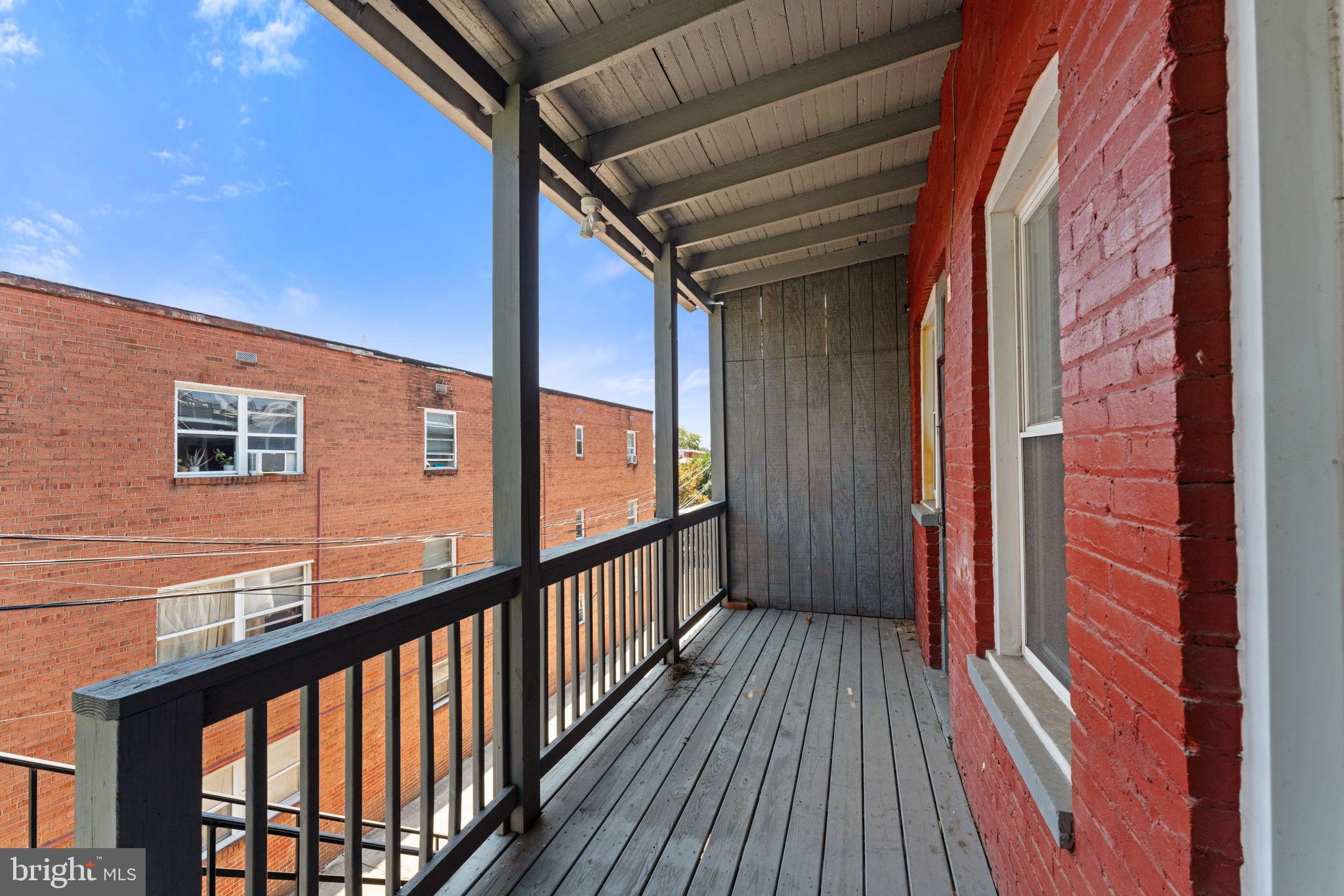 2707 11th Street Northwest Washington, DC 20001 - Photo 46 of 49 a view of balcony with wooden floor