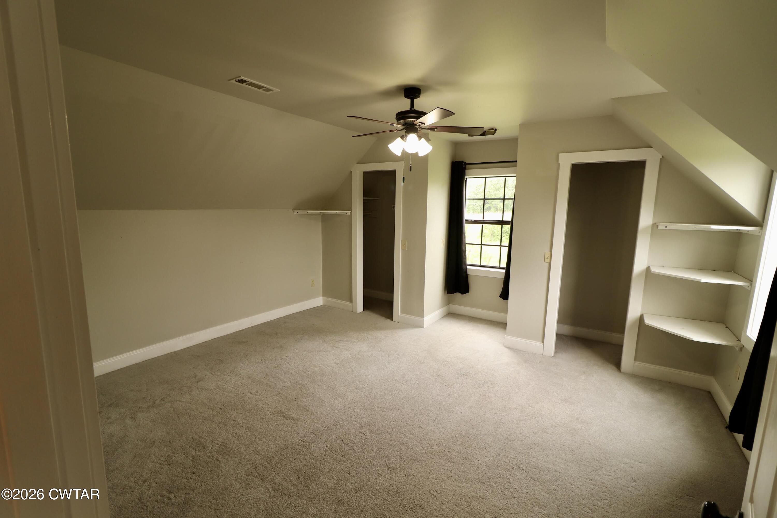 286 Baseline Road Kenton, TN 38233 - Photo 22 of 27 a view of an empty room with a window