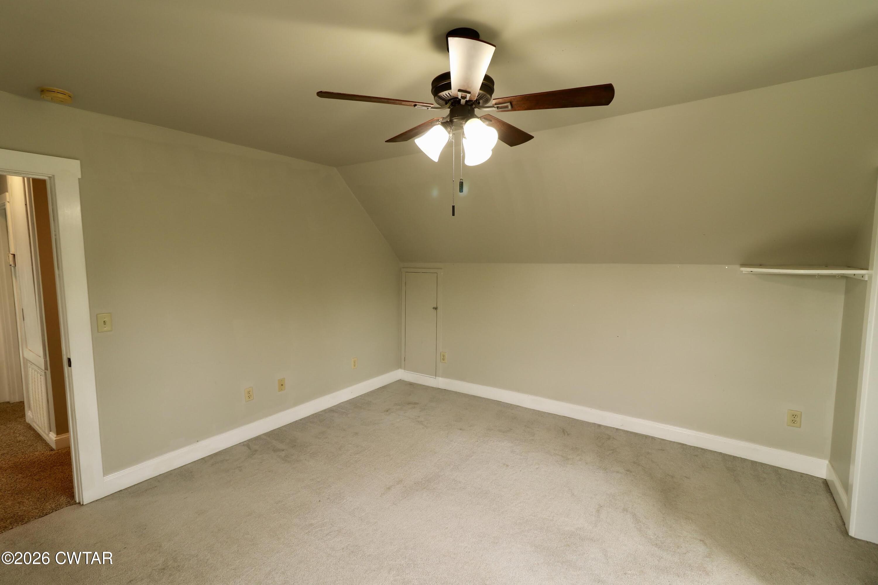 286 Baseline Road Kenton, TN 38233 - Photo 27 of 27 an empty room with a window and a fan