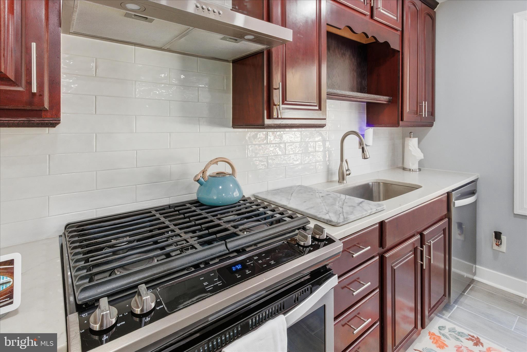 2816 Ridge Road Waldorf, MD 20603 - Photo 17 of 46 a stove top oven sitting inside of a kitchen