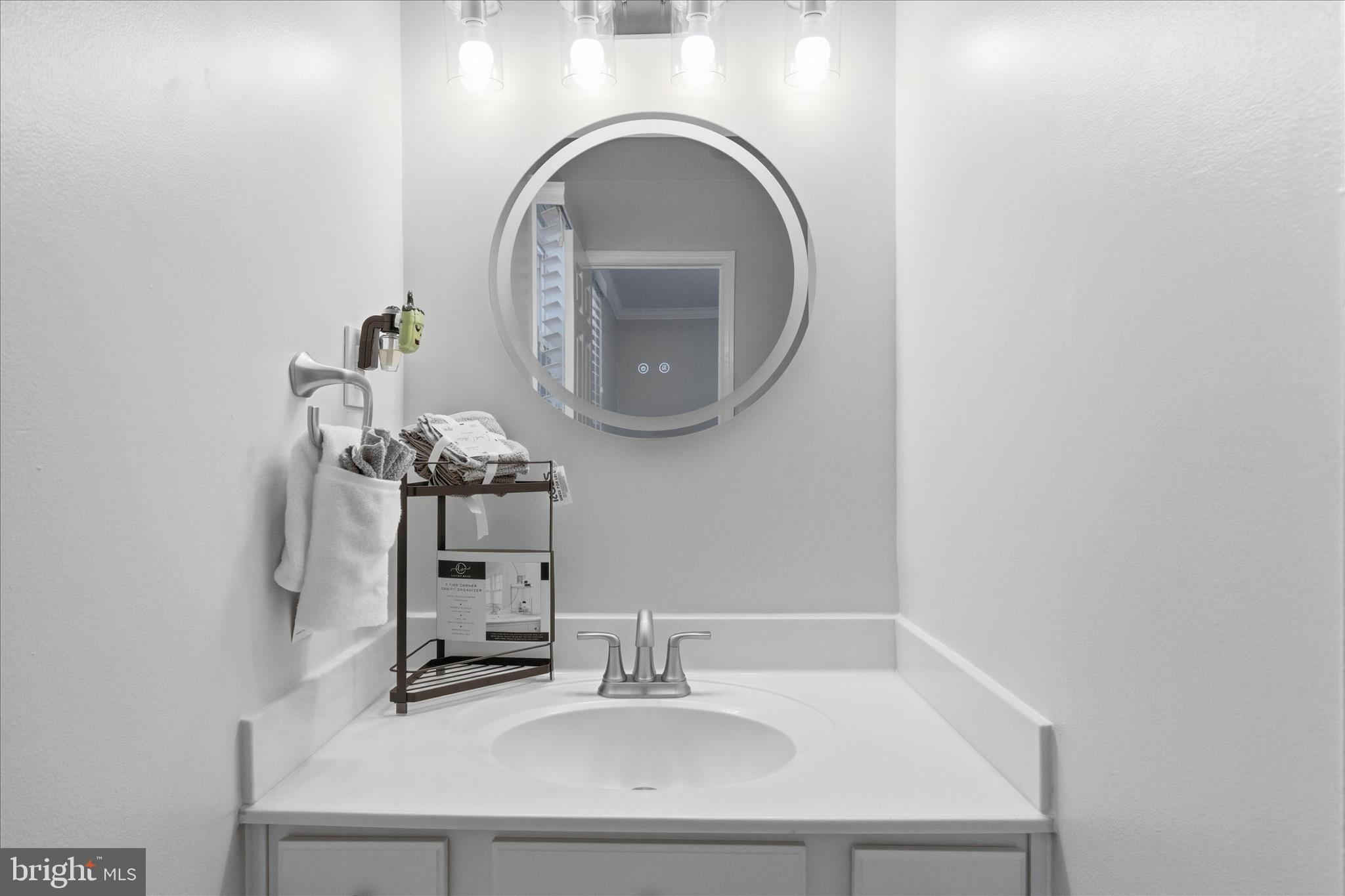 2816 Ridge Road Waldorf, MD 20603 - Photo 37 of 46 a bathroom with a sink and a mirror