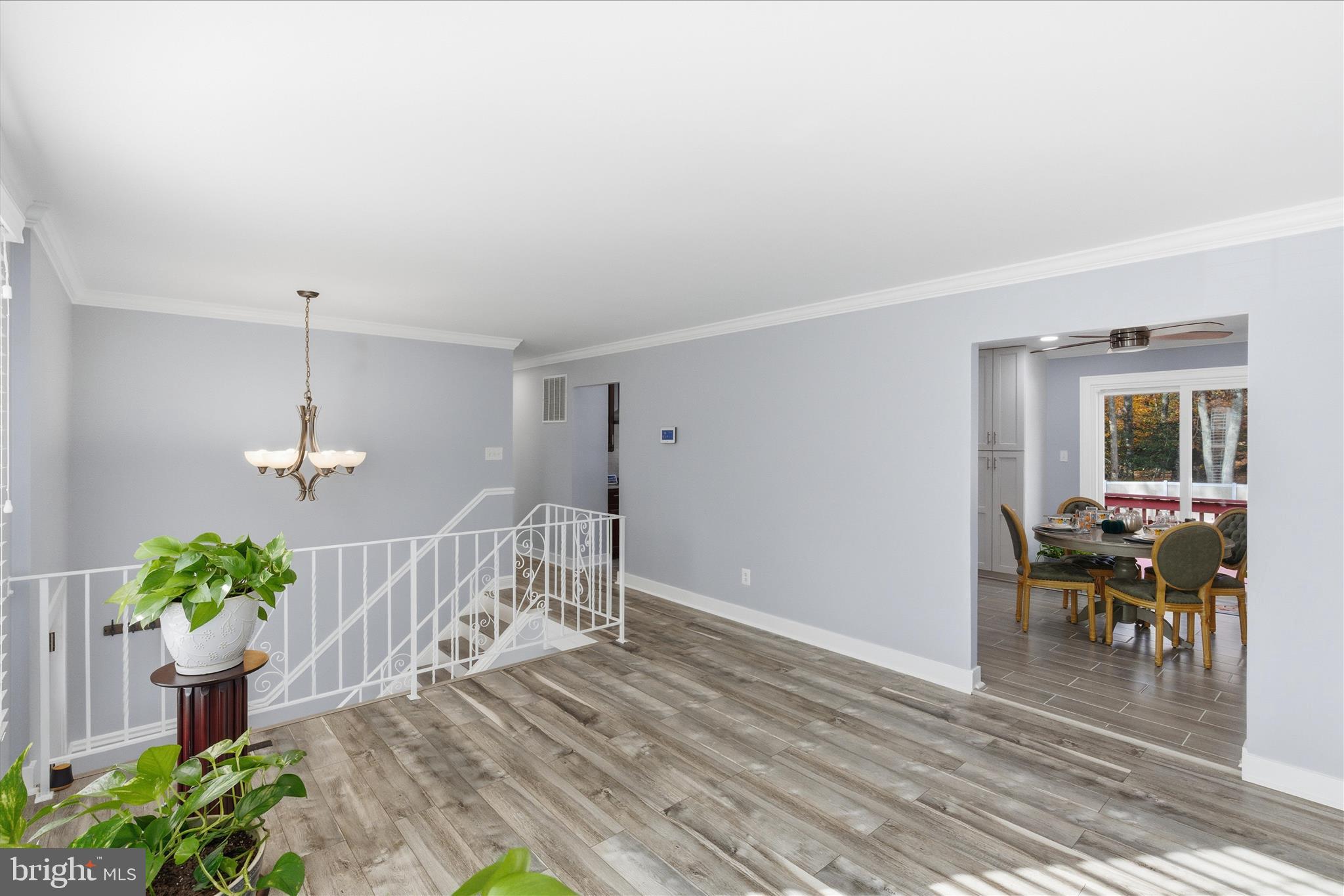 2816 Ridge Road Waldorf, MD 20603 - Photo 6 of 46 a view of a dining room with furniture window and wooden floor