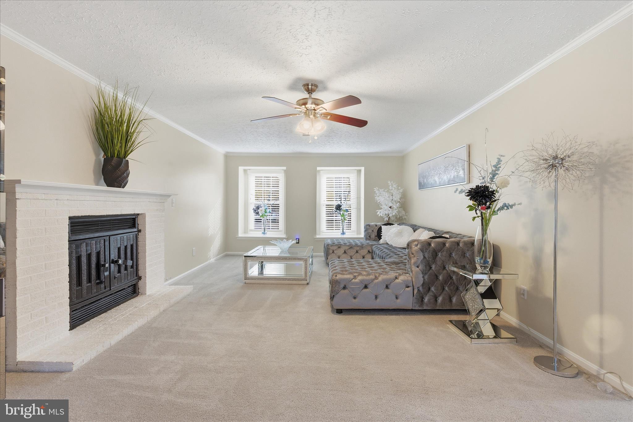 2816 Ridge Road Waldorf, MD 20603 - Photo 8 of 46 a living room with furniture and a fireplace