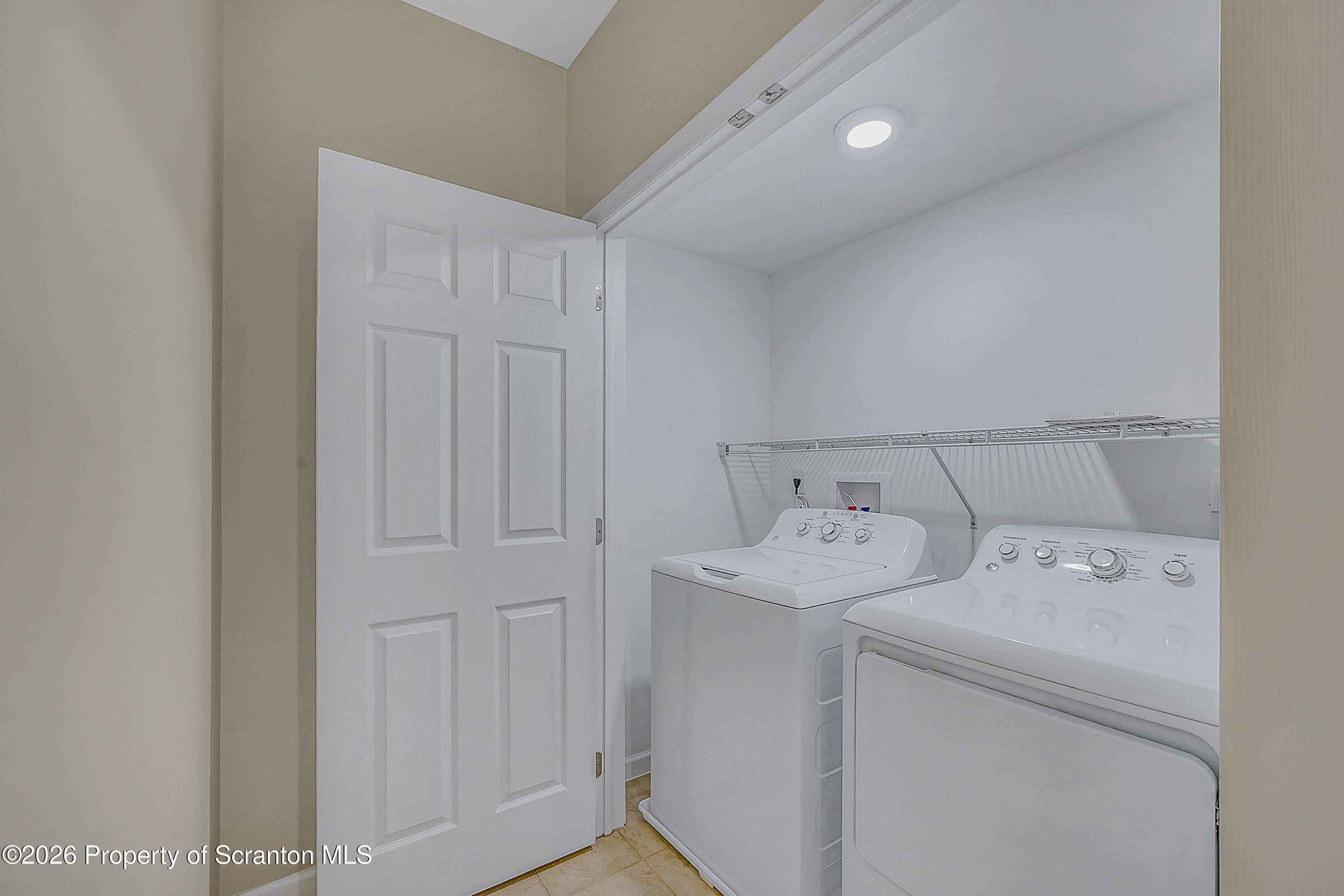 42 Wyndham Road Clarks Summit, PA 18411 - Photo 17 of 36 a utility room with dryer and washer