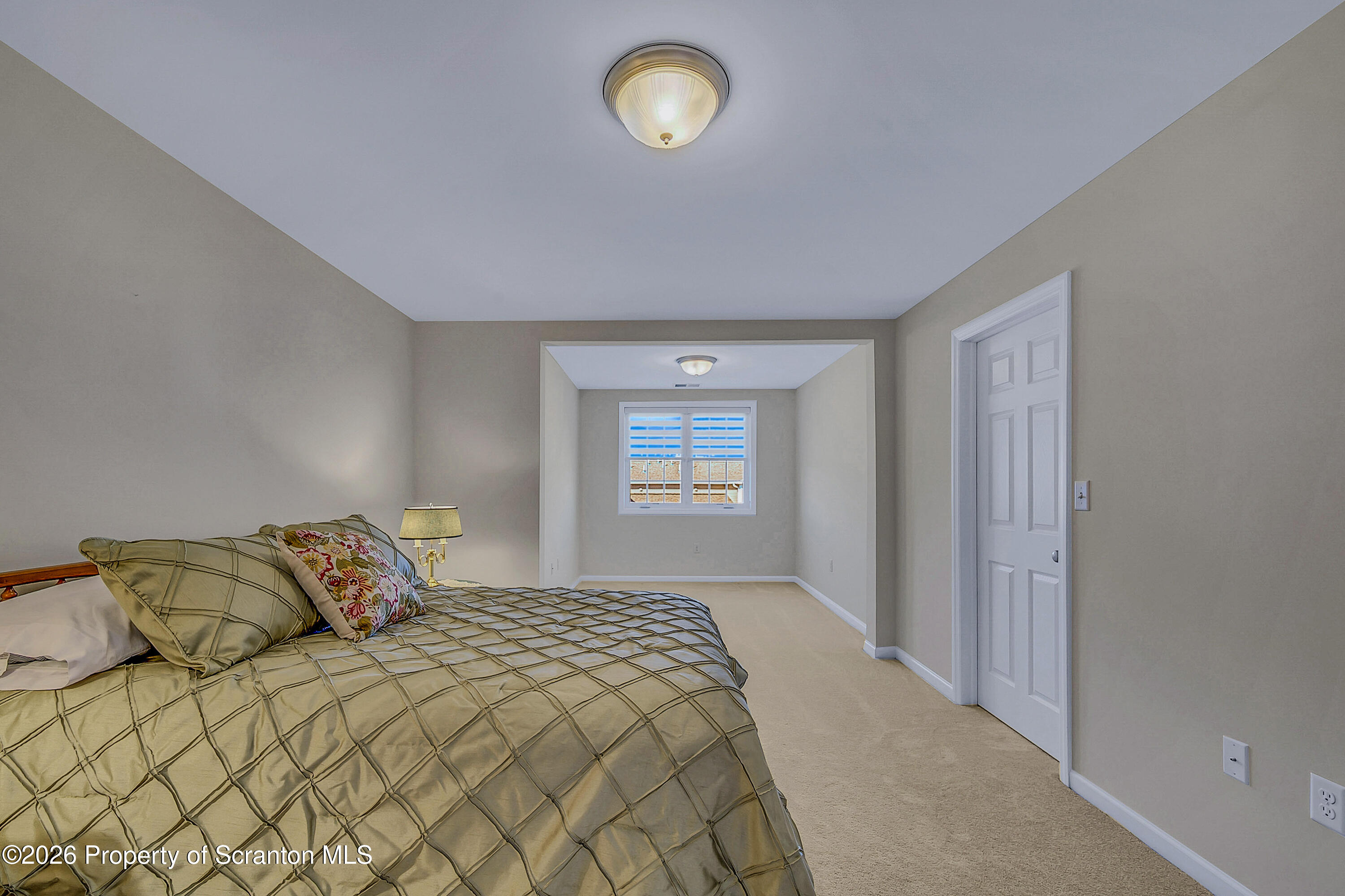 42 Wyndham Road Clarks Summit, PA 18411 - Photo 21 of 36 a bedroom with a bed and a window