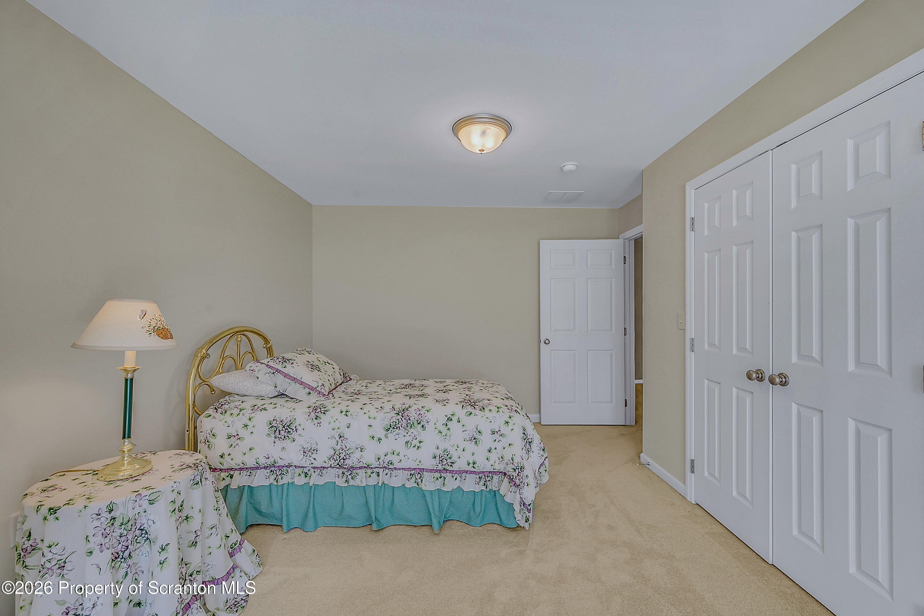 42 Wyndham Road Clarks Summit, PA 18411 - Photo 25 of 36 a bedroom with a bed and dresser
