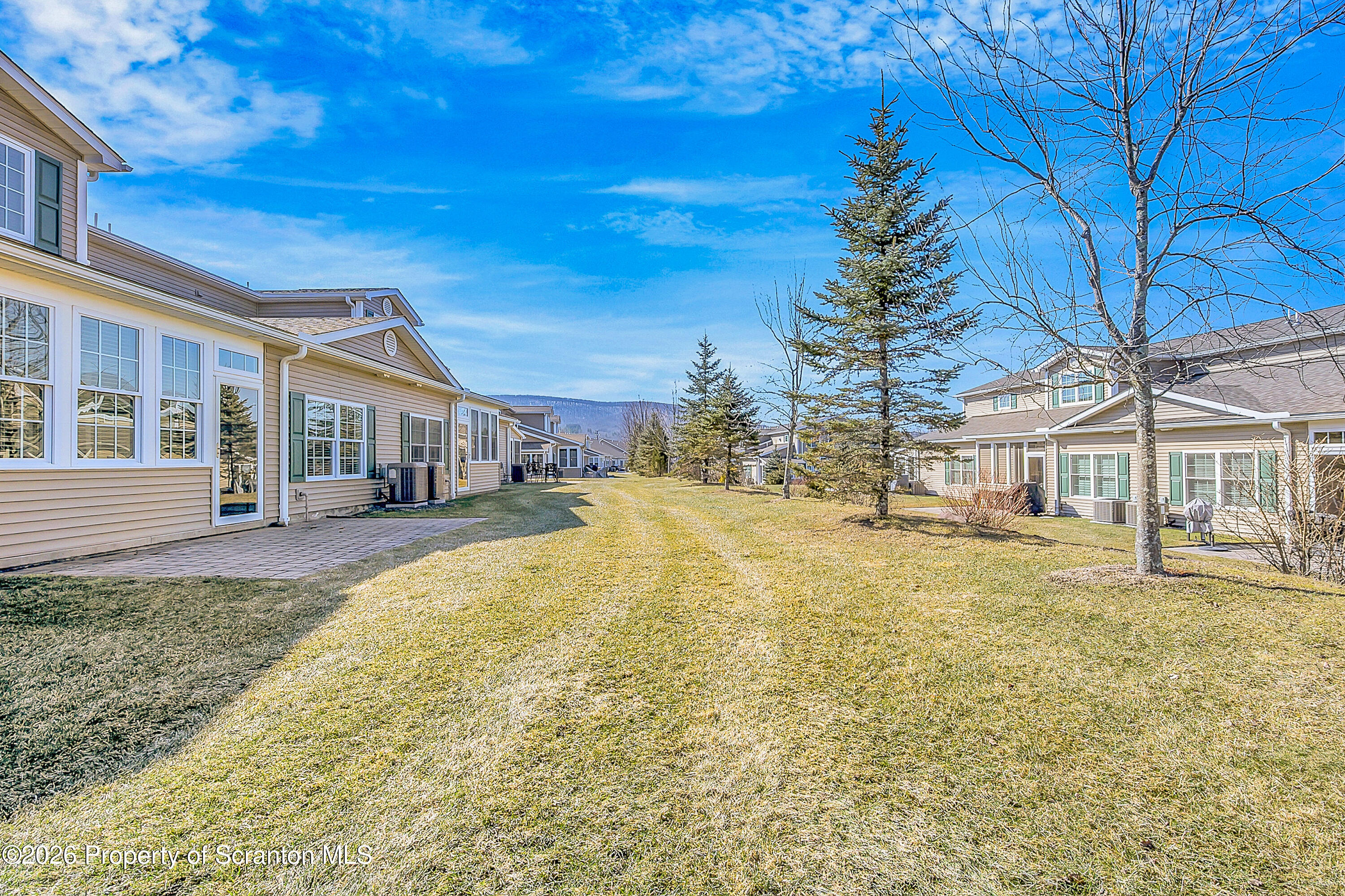 42 Wyndham Road Clarks Summit, PA 18411 - Photo 30 of 36 a view of house with yard and swimming pool