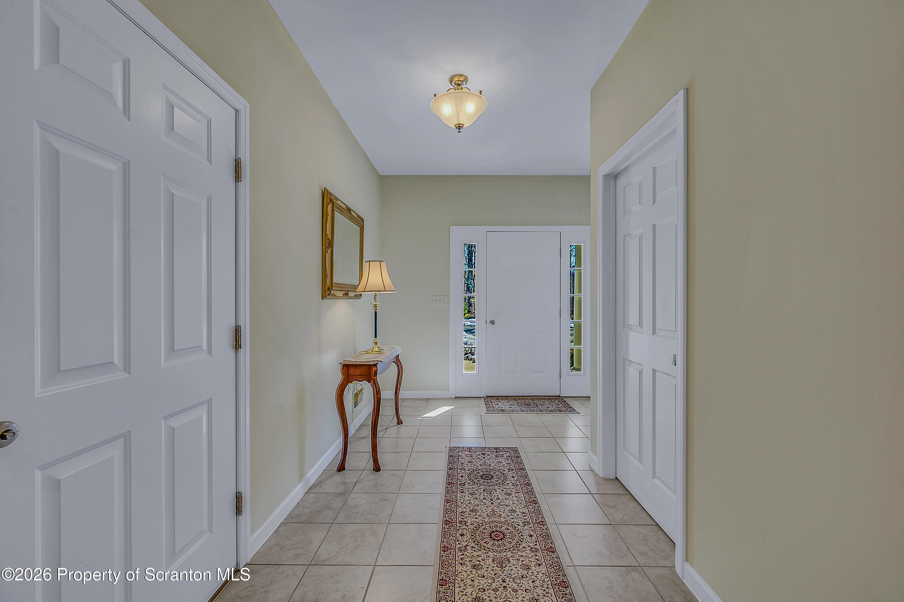 42 Wyndham Road Clarks Summit, PA 18411 - Photo 3 of 36 a view of a hallway with front door
