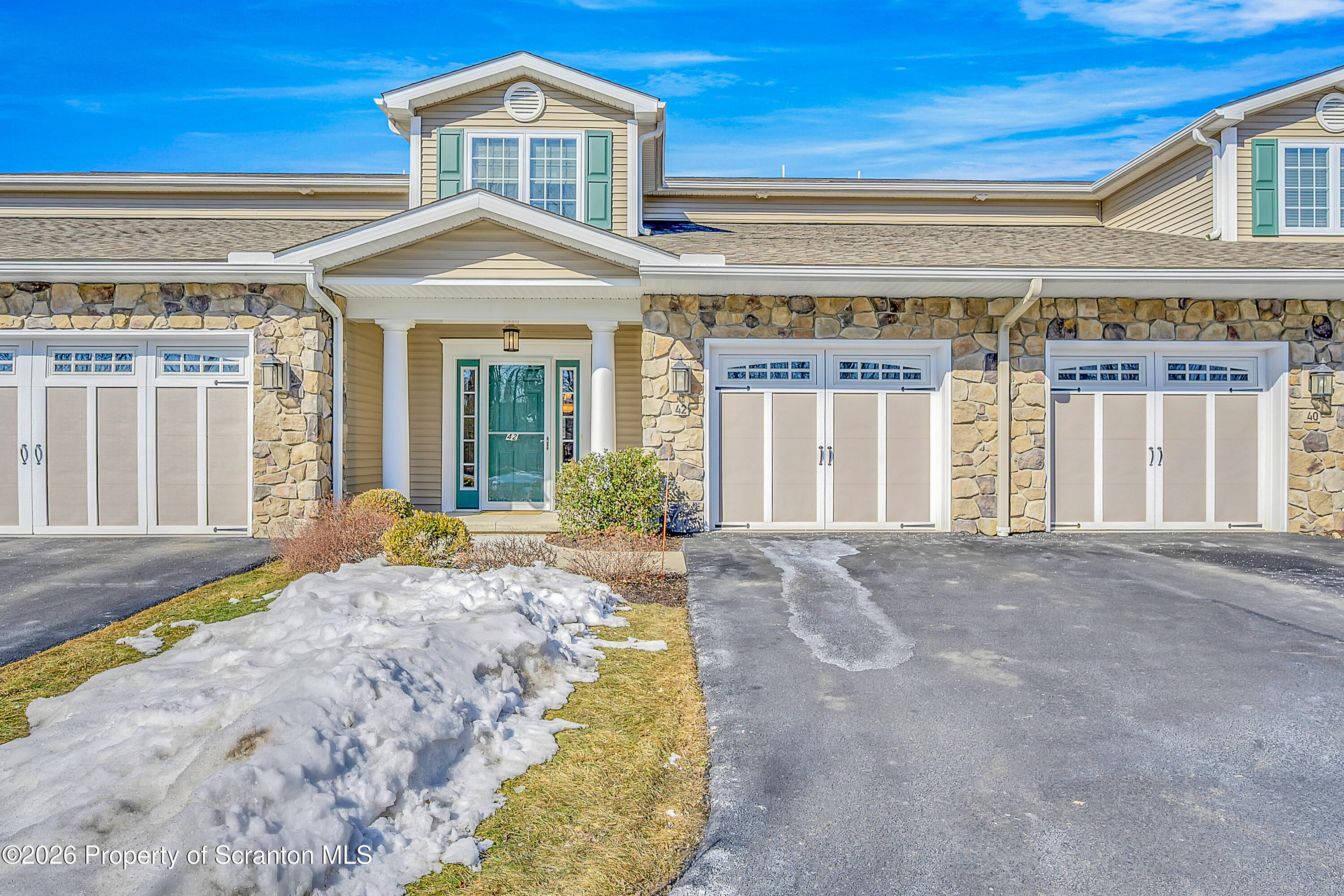 42 Wyndham Road Clarks Summit, PA 18411 - Photo 32 of 36 front view of a house with a yard