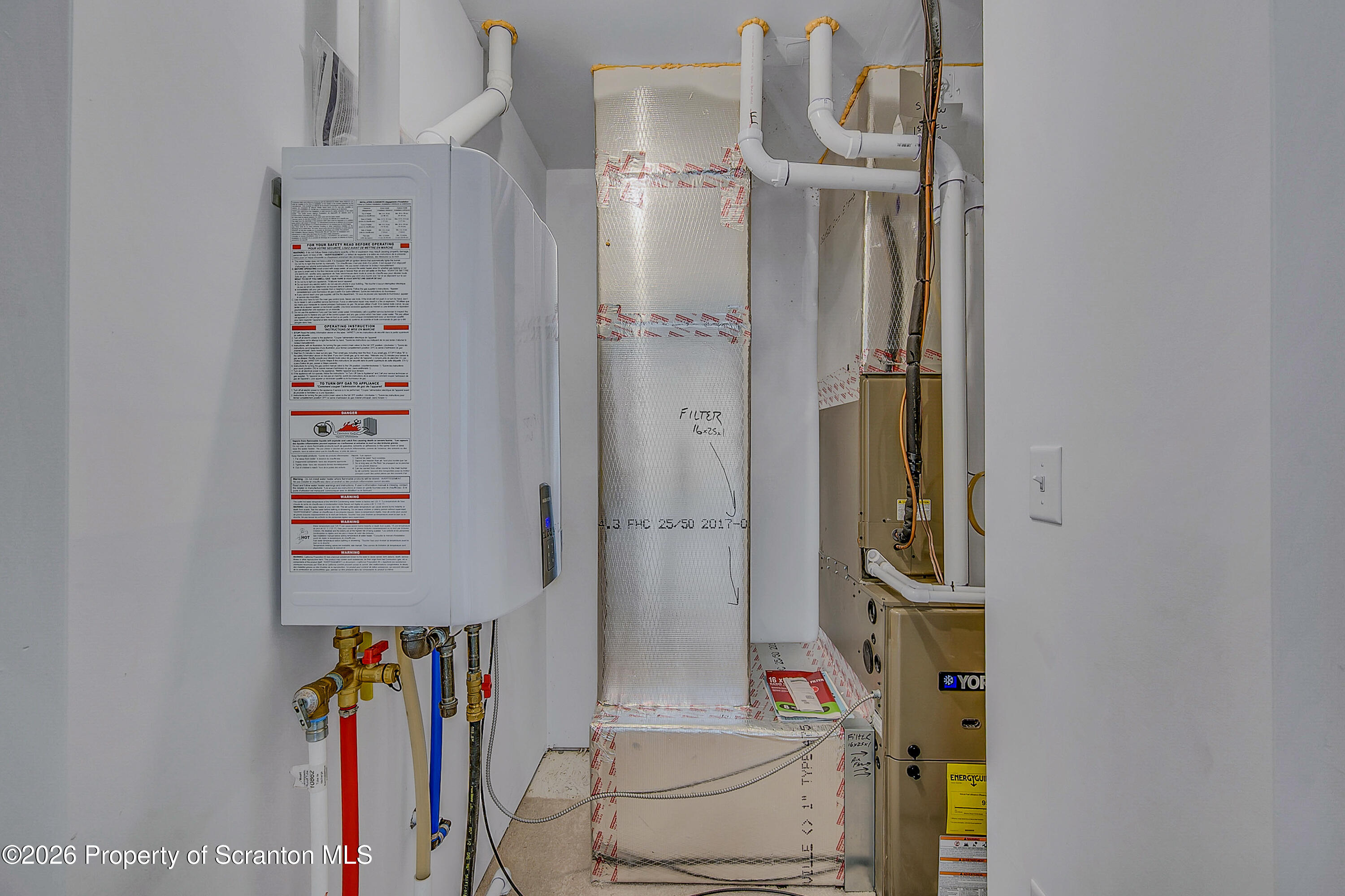 42 Wyndham Road Clarks Summit, PA 18411 - Photo 35 of 36 walk in closet with clothes and shoes