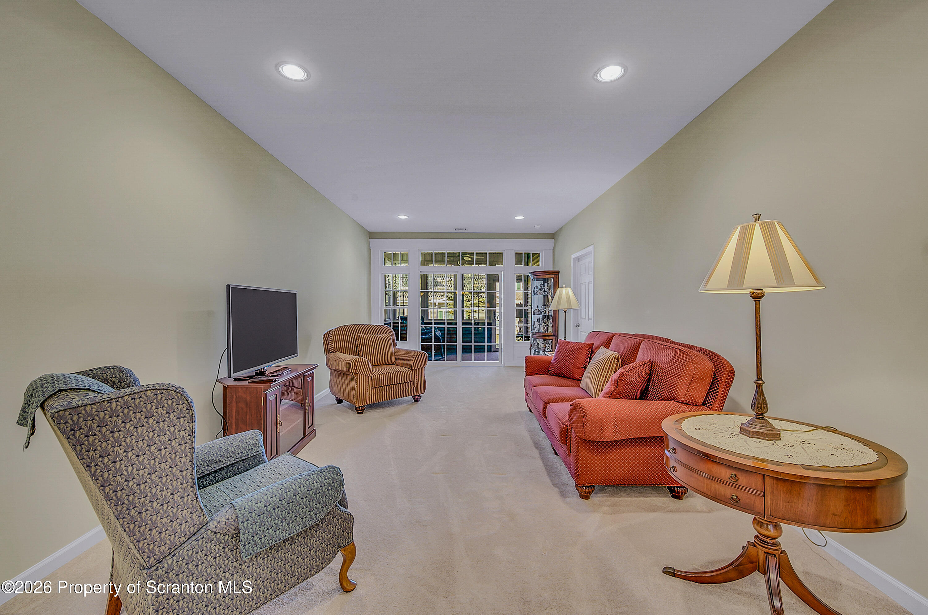42 Wyndham Road Clarks Summit, PA 18411 - Photo 4 of 36 a living room with furniture and a wooden floor