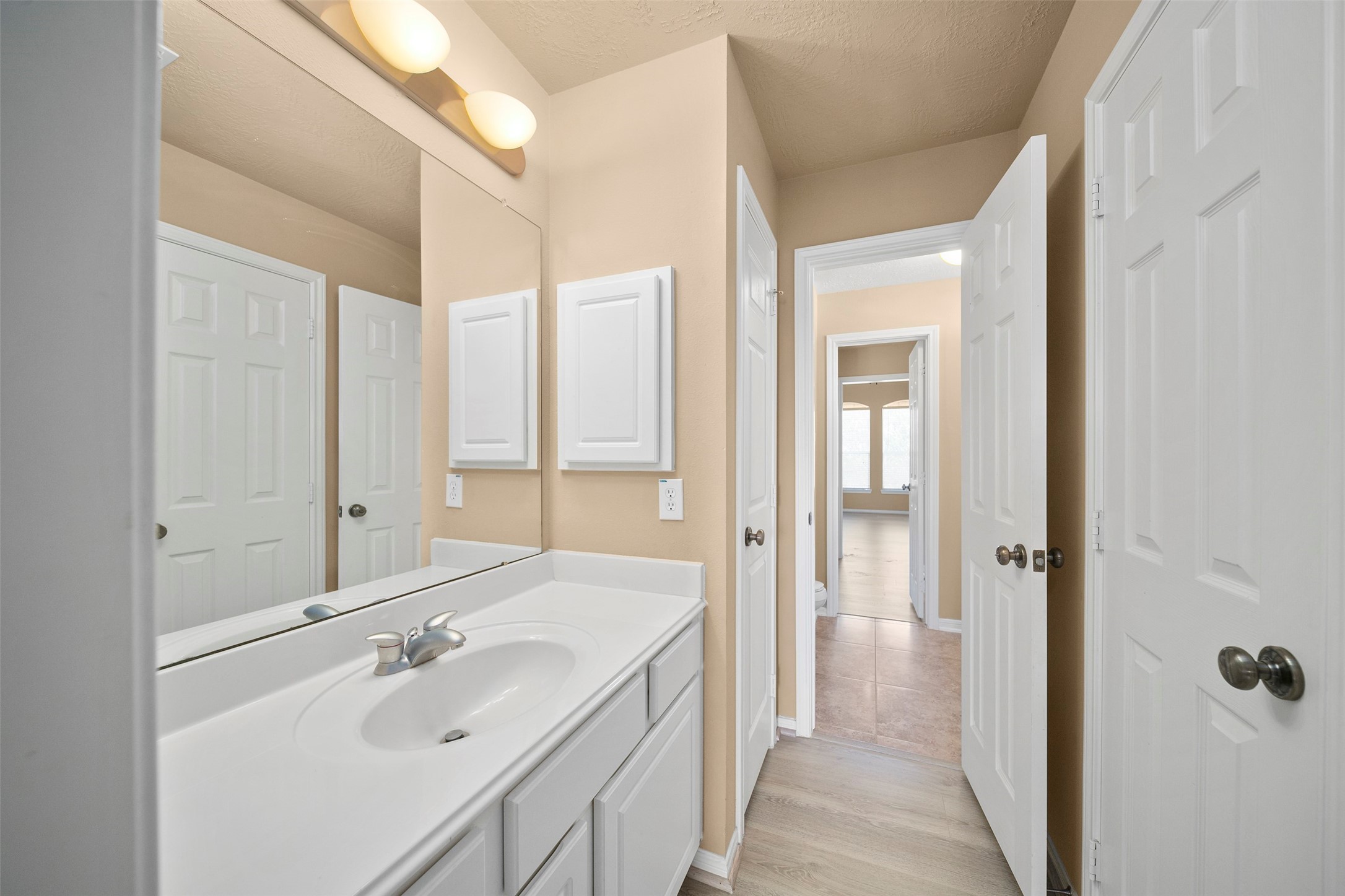 12311 Amanda Meadows Houston, TX 77089 - Photo 34 of 42 a bathroom with a sink a toilet and shower