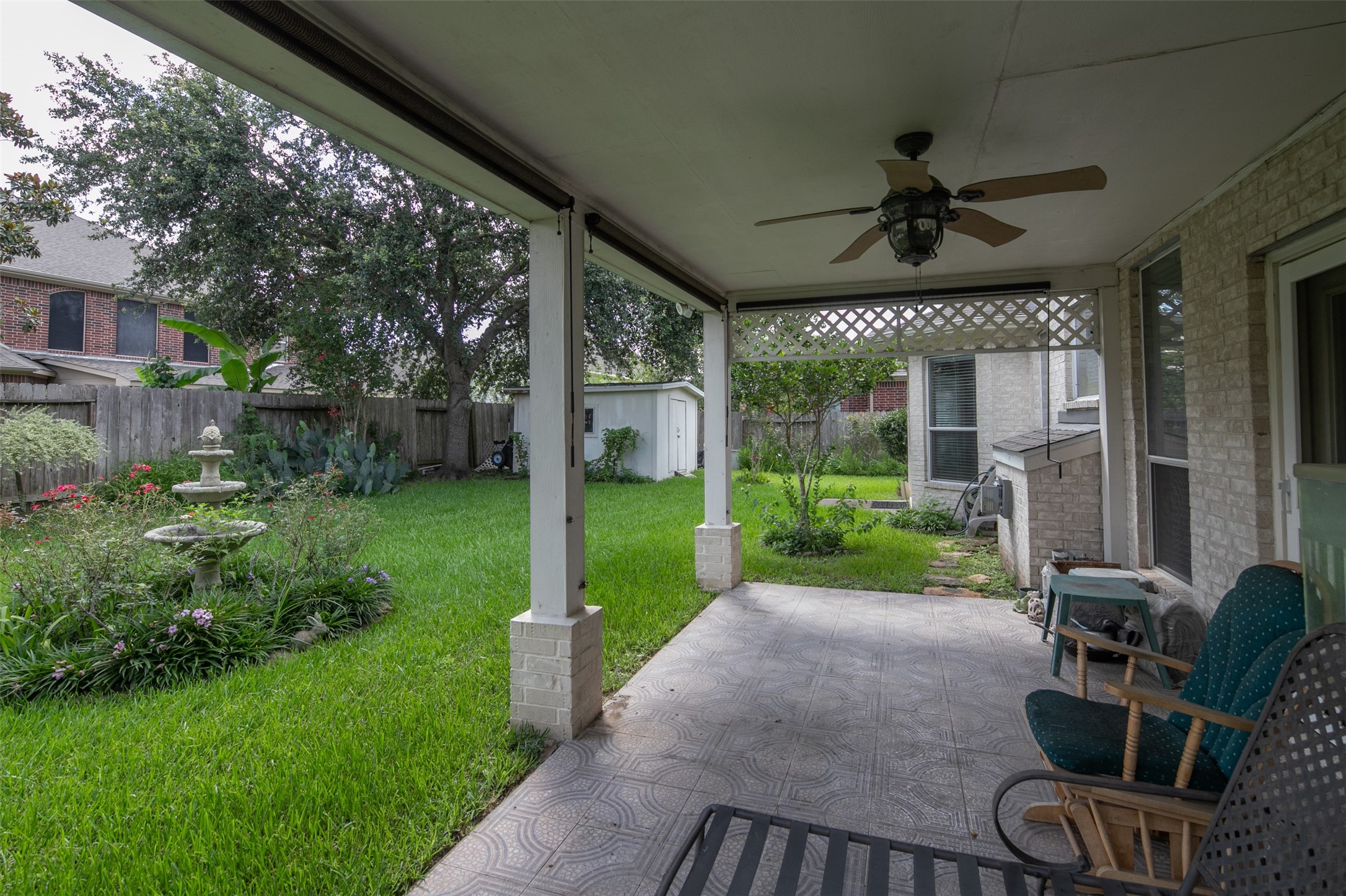 12311 Amanda Meadows Houston, TX 77089 - Photo 38 of 42 a view of a porch with furniture and a yard