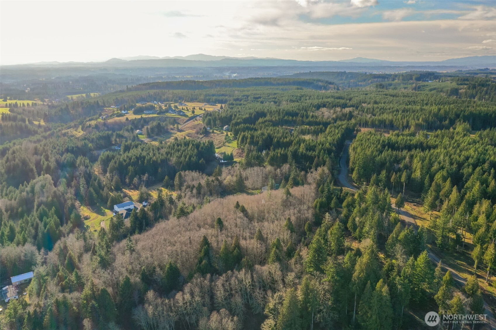 0 Hewitt Road Chehalis, WA 98532 - Photo 10 of 15 a view of a lake with mountains in the background