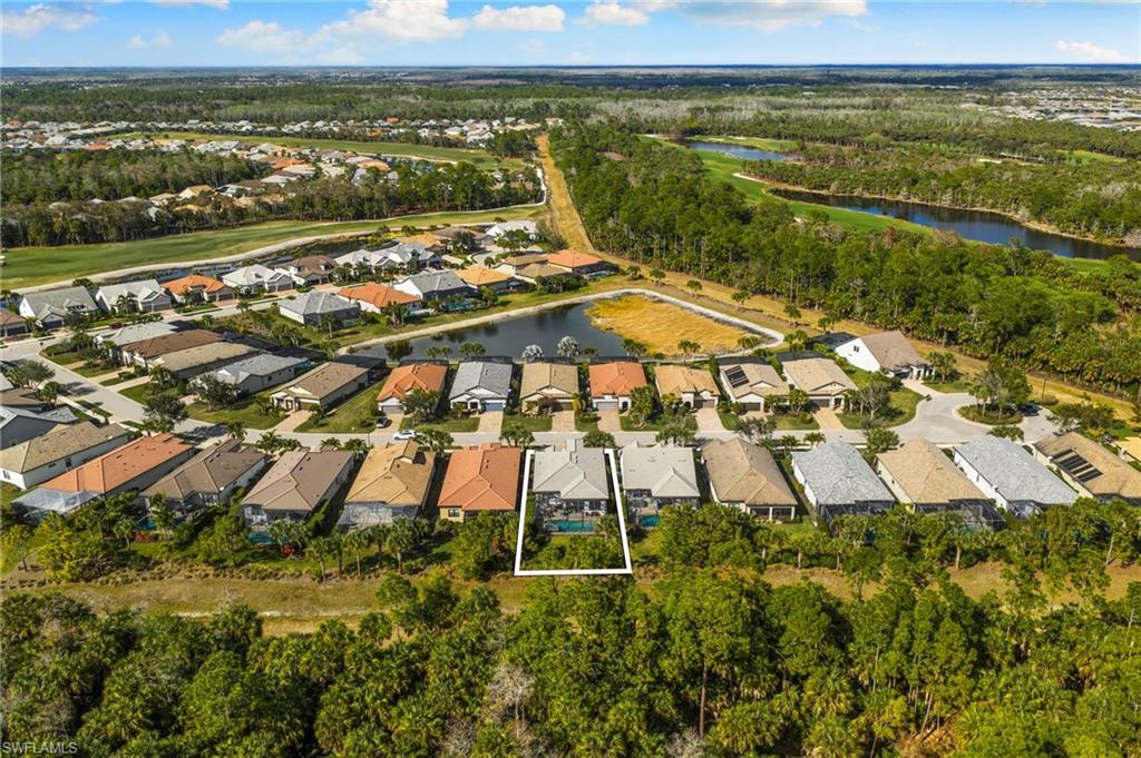 9410 Whooping Crane Way Naples, FL 34120 - Photo 35 of 38 a view of a city with an ocean view