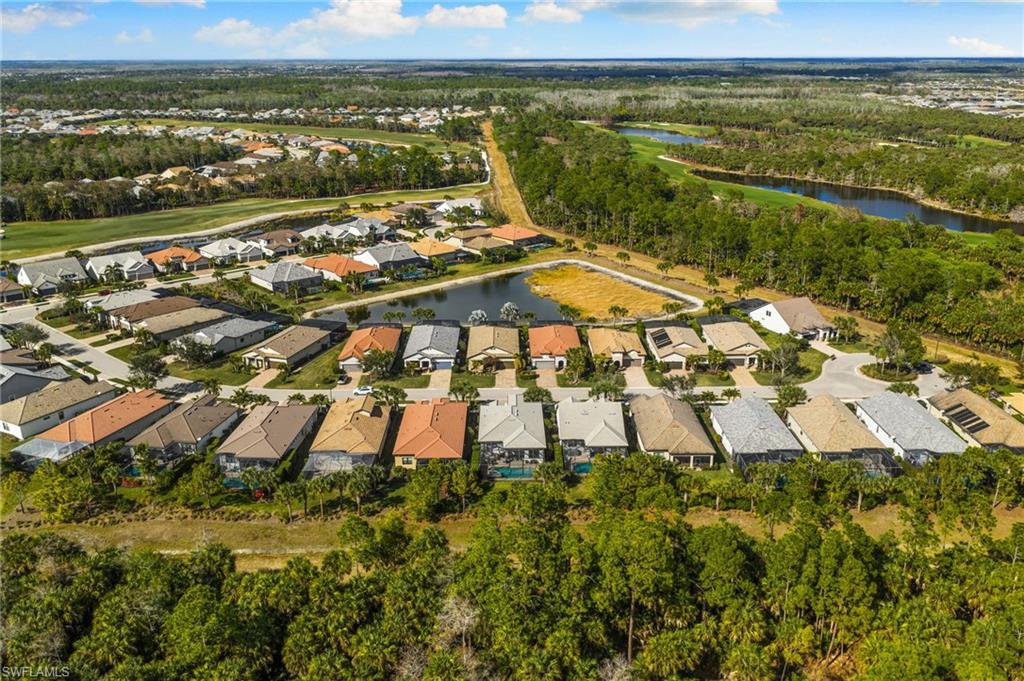 9410 Whooping Crane Way Naples, FL 34120 - Photo 37 of 38 a view of a city with an ocean view