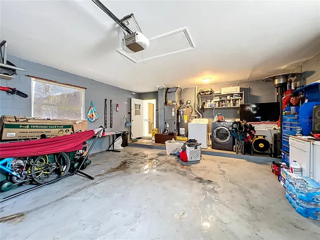 a view of a garage with rack and bicycle
