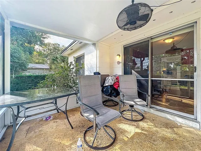 a room with furniture and a large window