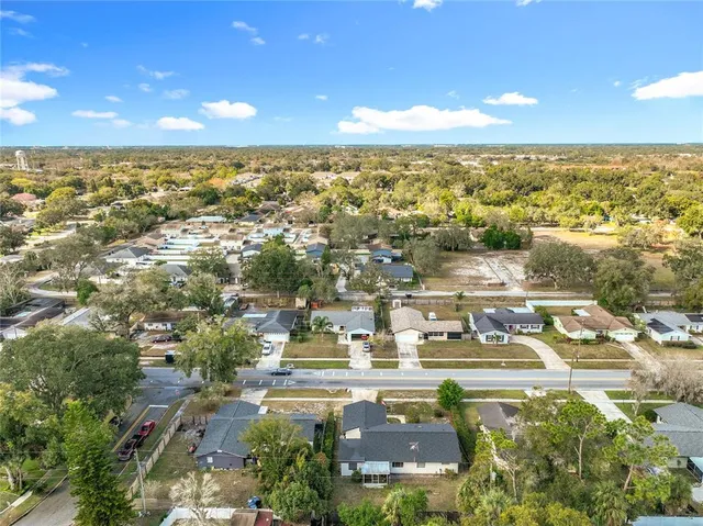 an aerial view of residential building with parking space