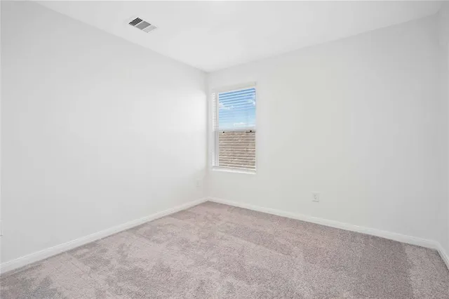 an empty room with a workbench