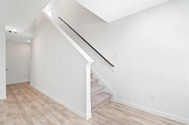 a view of entryway with stairs