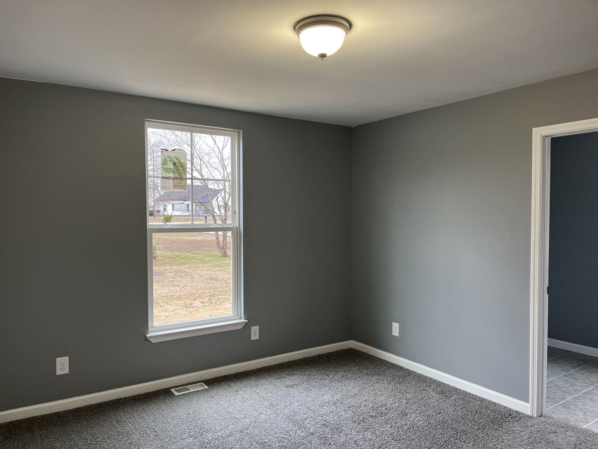 203 5th Avenue North Decherd, TN 37324 - Photo 12 of 13 an empty room with a window
