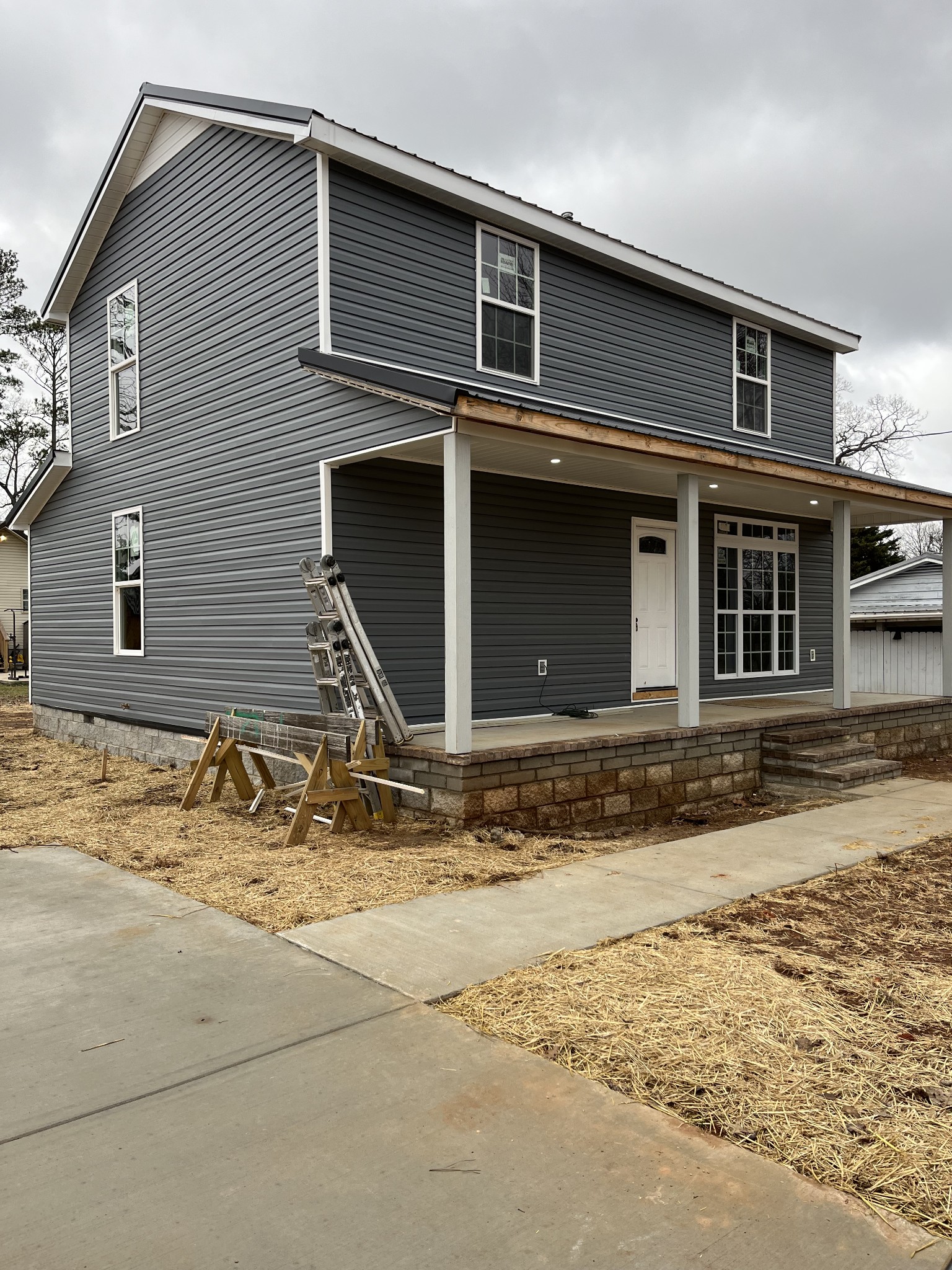 203 5th Avenue North Decherd, TN 37324 - Photo 2 of 13 a front view of a house with a yard